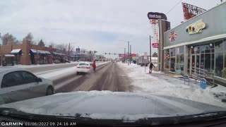 Woman Attacks a Car in Traffic in Denver