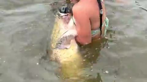 2 Huge fish in 1 hole