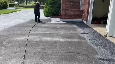 Professional Asphalt Spray Sealing: “The Looper One” Top Coat Pavement Maintenance