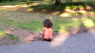 Child riding skateboard