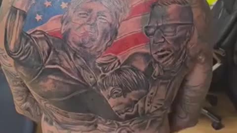 Trump Follower shows off the artwork on his Back of the Failed Assassination attempt