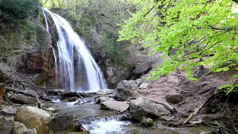 Small waterfall and a stream in nature #samall.water #waterfall #nature #viral