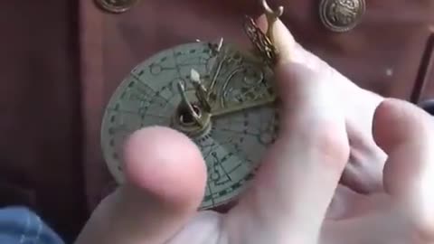 An elaborate portable and foldable 19th century necklace sundial