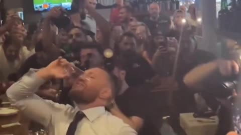 Conor McGregor serving drinks at a Bar in New Jersey