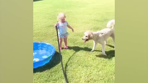 funny babies playing with water