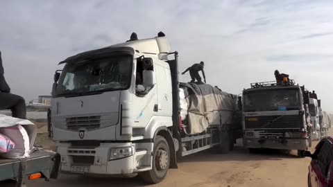 Trucks loaded with food aid entered the northern Gaza Strip this afternoon