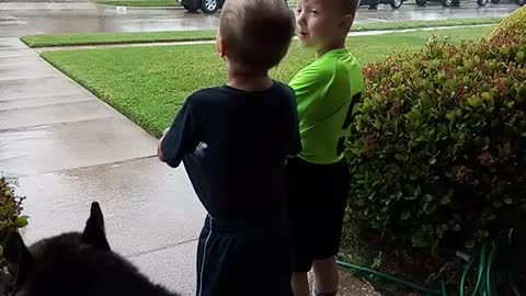 Cason, Jaxson and Dakota in the rain