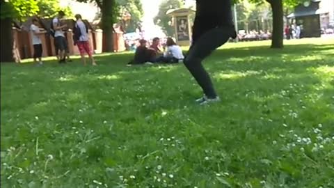 Guy black clothes back flip grass fourth time fail