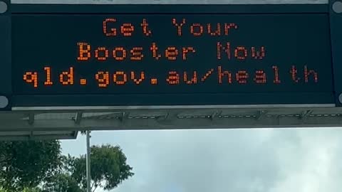 Dave Oneegs Ute Chat. Roadside with a Covid Billboard.