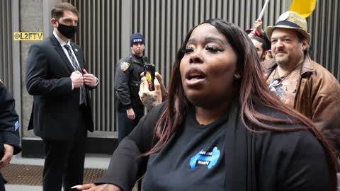 Hillary Clinton gets heckled by protesters in New York City