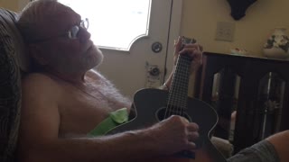 Dad playing guitar 7