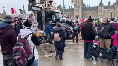 Freedom Convoy in Ottawa - The horns don’t honk as often. But they do for a few seconds when the kids here ask a trucker to do it or following a speech