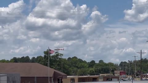 Medical helicopter landing at the Arkansas shooting scene