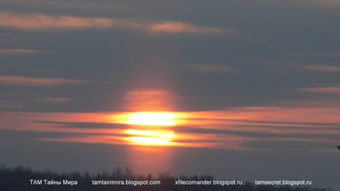 Sun pillar at sunset