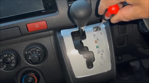 How to Operate the Shift Lock Release on a 2018 Toyota Hiace Commuter