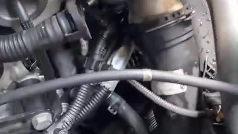 Add antifreeze to BMW and find that the pipe below is leaking