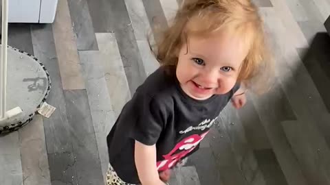 Little girl has fun making a mess