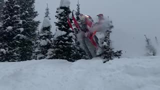 Snowmobile Jump Leads Directly Into Tree