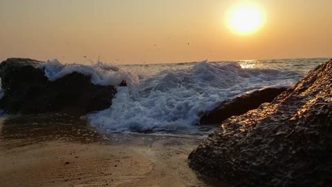 Waves Crashing on Beach Shore