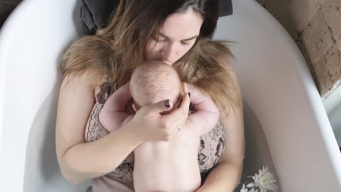 Twin baby girls fight over pacifier