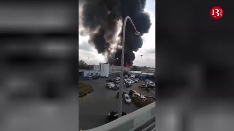 STRONG blaze at an oil base in Russia’s St Petersburg -Large number of fuel trucks stationed in area