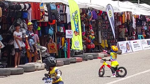 Boy in Bike Race Gets Distracted