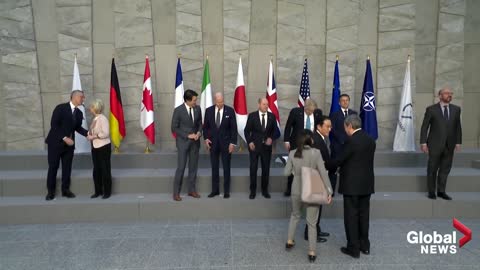 World leaders pose for "family photo" in Brussels