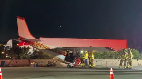 Cessna Parked on Busy Highway After Emergency Landing