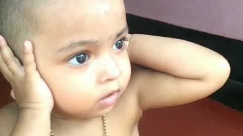 Adorable Indian Child didn't expect Fireworks sounds