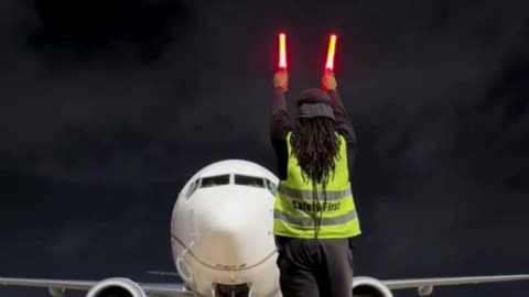 Ground Staff Marshalling a Flight—Coordination at Its Best! ✈️🤚