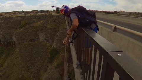 Jaw Dropping Throw and Go Base Jumping Stunt