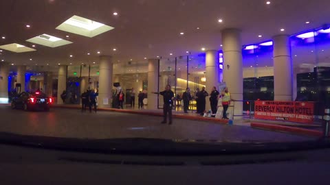 Beverly Hilton tonight Spanish-speaking people protesting at the gates of the hotel