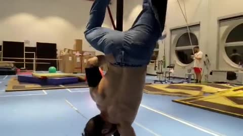 Guy Shows Amazing Skills While Performing Acrobatic Tricks On a Pole