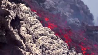 Sizzling lava flows out from Italy's Mount Etna