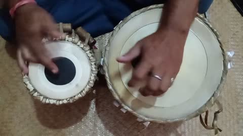 Traditional Music Indian man Playing a tabla