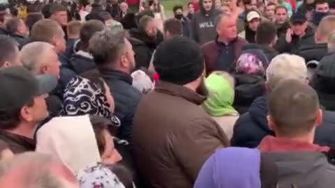 Right Sector' thugs attempt to break the cordon consisting of parishioners of church