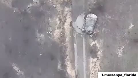 The commander of a Russian tank manually clears the way from Ukrainian mines.