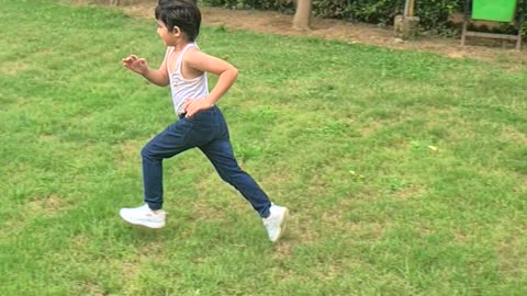 Kid slow motion video, enjoying an Athlete like run