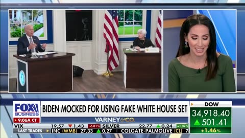 Why is Biden using a fake White House set?