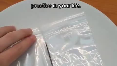 Guy Heats Knife Blade Using Induction Heater to Divide Plastic Bag in Two and Seal it