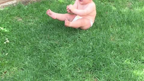 Cute Baby Hates Sitting on Grass