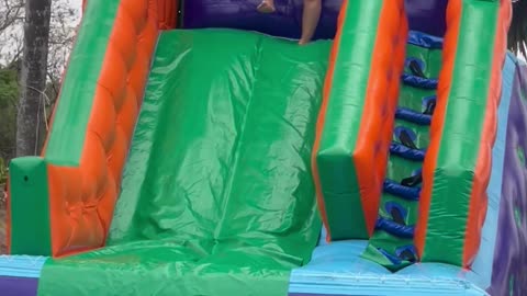 Woman Fails Down Water Slide