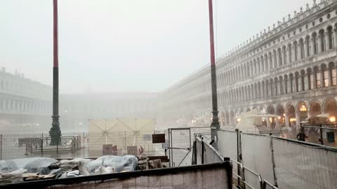 Rain Pours on Tourists in Venice