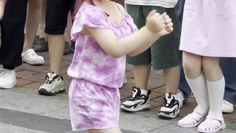 Korean cute little girl performing K-pop dance