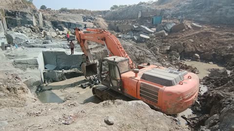 "Thunderous JCB Action: Rumbling Through Quarry Operations!"