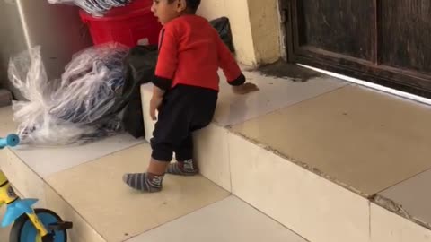 Kid climbing stairs