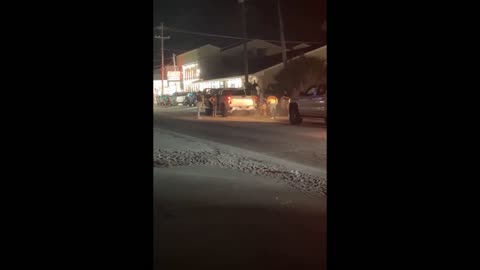 Guy gets slammed on truck during fight, truck takes off with his belt still attached