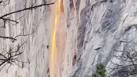 Sunlight Turns Waterfall into Firefall