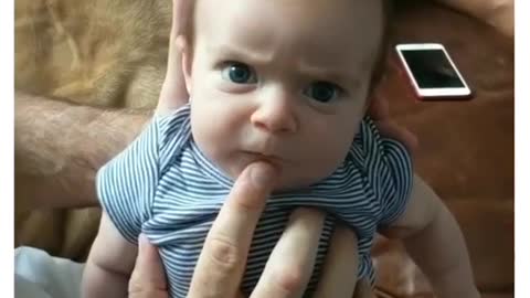 angry baby speaking with father