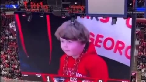 Fans at Game Cheered every time this kid came on the screen and booed when it went on someone else.